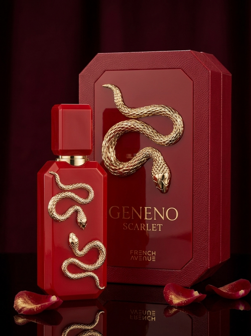 French Avenue ENENO SCARLET perfume bottle with gold snake on dark studio backdrop at Al Sahar