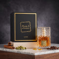 Buy authentic Lattafa Khamrah Dukhan Eau De Parfum (100ml) at Alsahar Oud. A deep smoky gourmand fragrance with dark amber, dates, and warm praline. Fast UK tracked delivery.